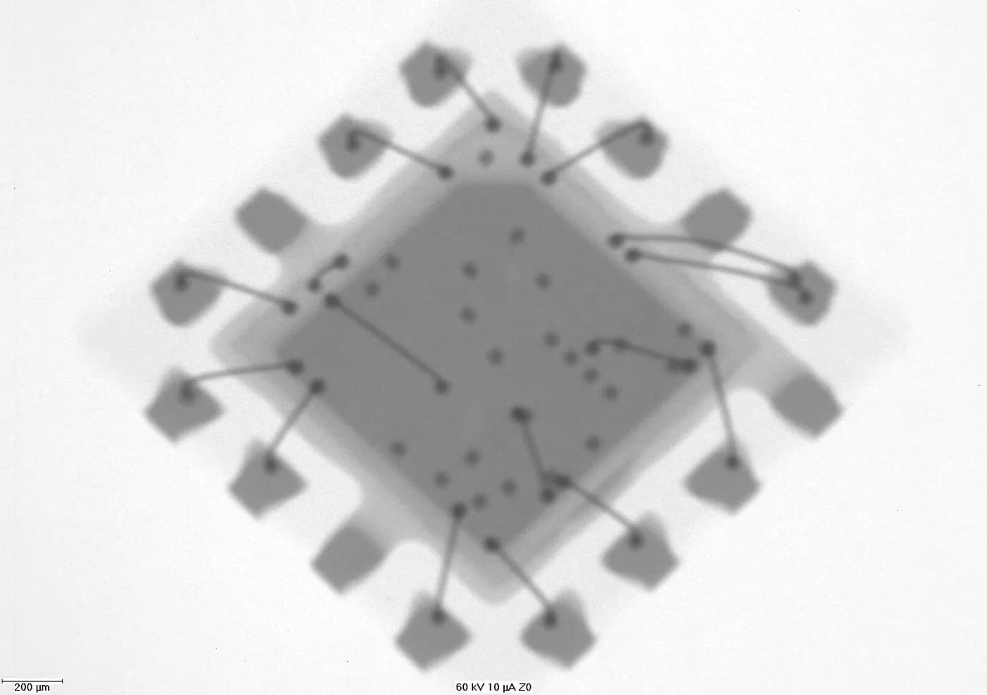X-ray of a packaged IC showing die, bond wires and lead frame